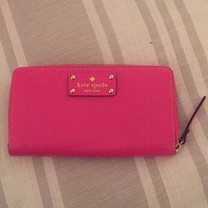 Kate spade pink wallet.